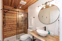Wood-lined shower at Wildhorse Cabin